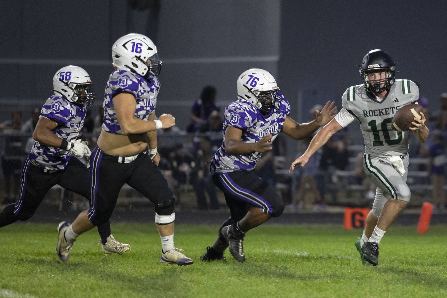 Rock Falls' Trail Stonitsch looks to pass while being chased by Dixon’s Jayden Neal Friday, Sept. 12, 2025.