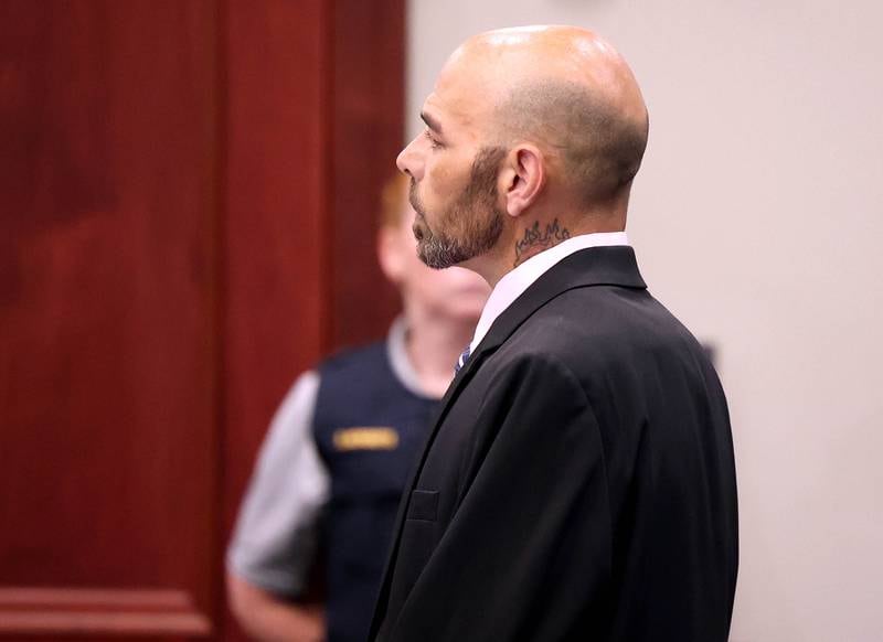 Nathan P. Sweeney, 45, of DeKalb, rises as Circuit Court Judge Marcy Buick enters the courtroom Thursday, June 26, 2025, at the DeKalb County Courthouse in Sycamore. Sweeney entered a plea of guilty Thursday for driving under the influence on March 28, 2024, and causing a crash that killed DeKalb County sheriff‘s deputy Christina Musil.