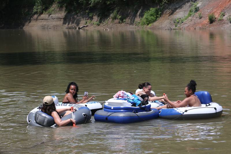 A group of rafters with River Bum Rafting float on the Vermilion River to cool off in the heat on Monday, July 15, 2024 at the boat launch in Oglesby. Temperatures climbed into the lower 90's for much of the day.