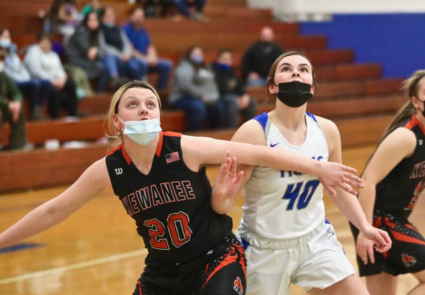 PHS senior Morgan Coleman and Kewanee's Lainey Kelly battled for position on a free throw Thursday at Prouty Gym. Coleman had 16 points to lead the Tigresses to a 55-45 Senior Night victory.