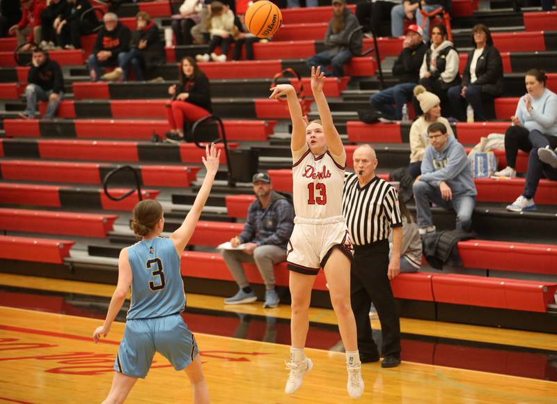 Hall's Leah Pelka lets go of a jump shot over Marquette's Morgan Nelson on Thursday, Feb. 13, 2025 at Hall High School.
