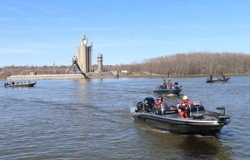 Anglers make their way into the harbor at the Spring Valley Boat Club during the National Walleye Tour Masters Walleye Circuit on Saturday, March 23, 2024.
