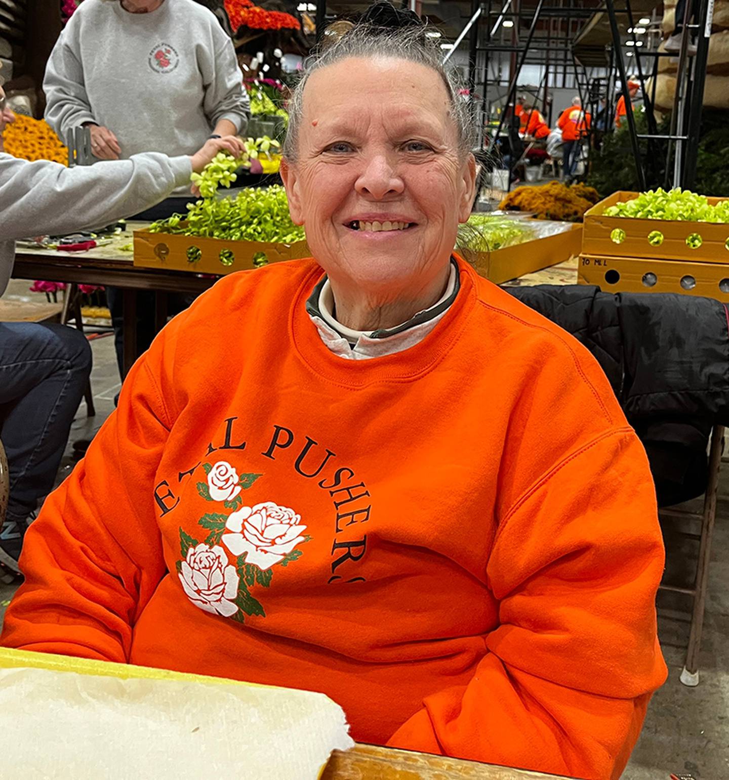 Dixon resident Chèrie Van Woz Arch helping decorate floats for the 2023 Tournament of Roses Parade