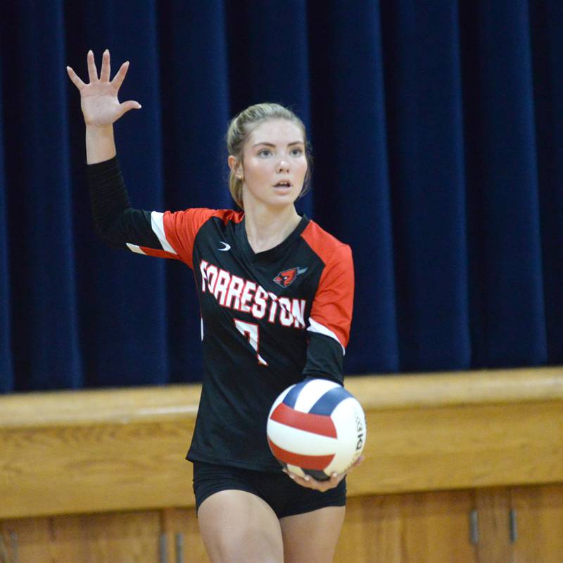 Forreston's Ennen Ferris (7) gets ready to serve against the Marcos during a Wednesday, Aug. 28, 2024 match at Polo High School.