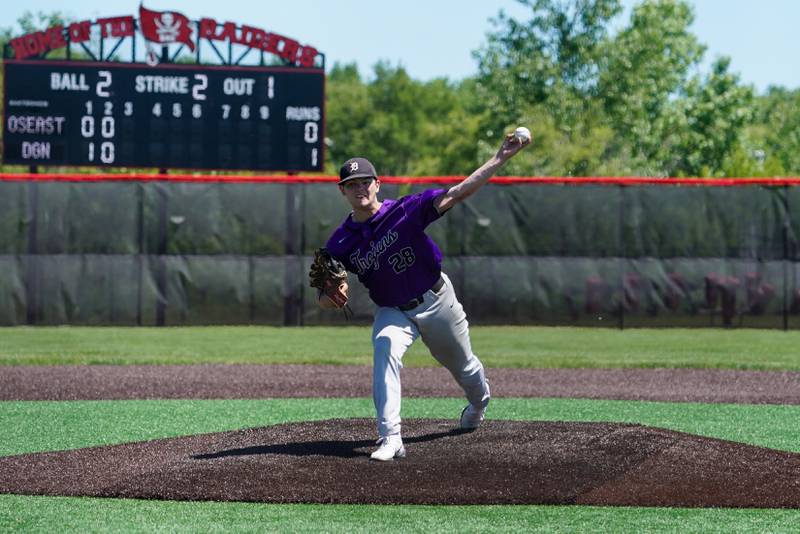 Downers Grove North's Braylon Tomlinson (28) delivers a pitch against Oswego East during a 4A Bolingbrook Regional Championship baseball game at Bolingbrook High School on Saturday, May 25, 2024.