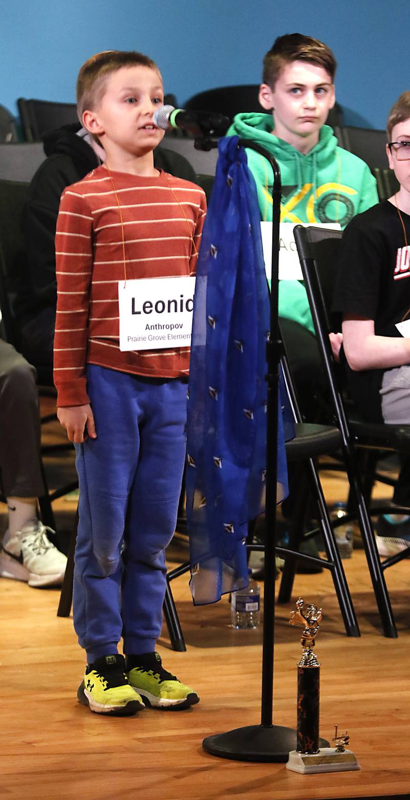 Leonid Anthropov of Prairie Grove Elementary School tries to spell bumblebee was he competes in the McHenry County Regional Office of Education 2023 Spelling Bee Wednesday, March 20, 2024, at McHenry County College's Luecht Auditorium in Crystal Lake.