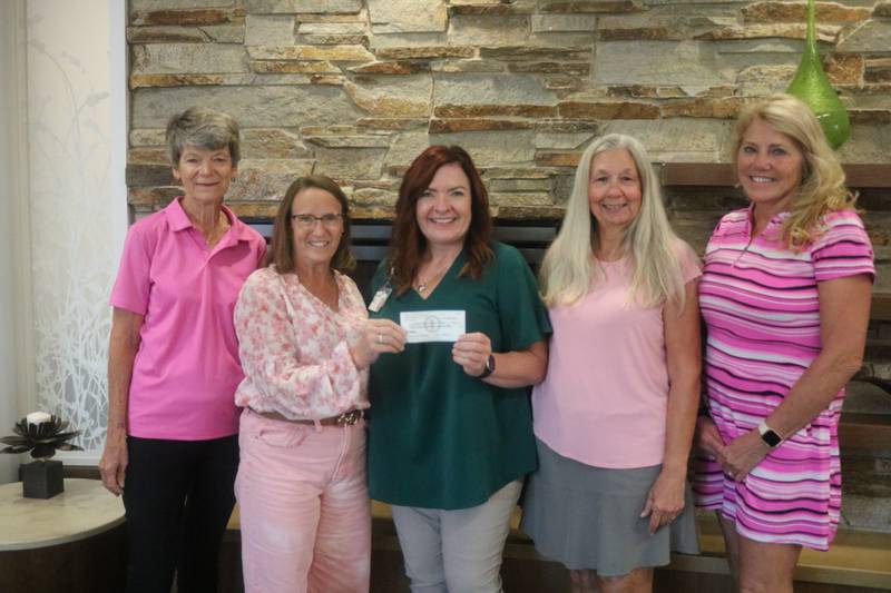 (From left) Jane Kible, Laura Geoghegan, Angela McCrum, Suz Augistine, and Kim Amour pose for a picture on Monday, Sept. 29, 2025, to commemorate their donation to the Kishwaukee Cancer Center in DeKalb.