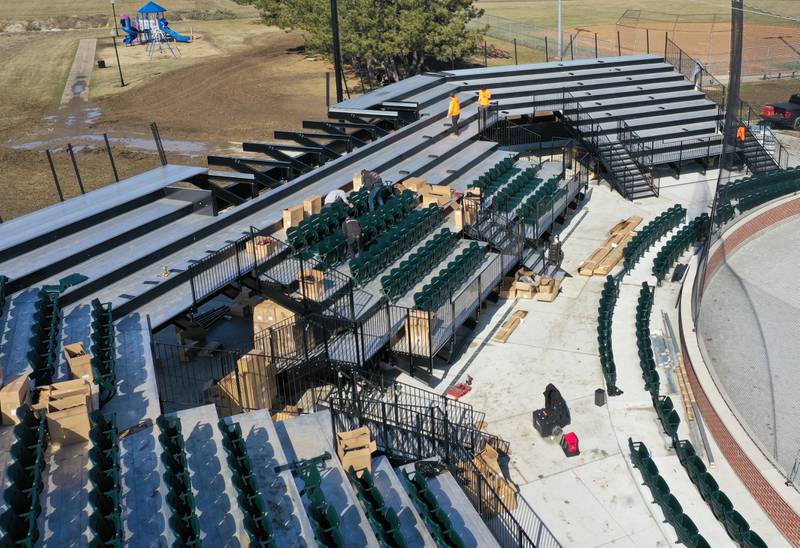 Workers from Hayden Construction installed box seats at Schweickert Stadium on Monday, March 6, 2023 in Peru. The stadium home of the Pistol Shrimp grandstand was approved by the Peru City Council last June. This phase included 575 box seats, a new grandstand and press box.