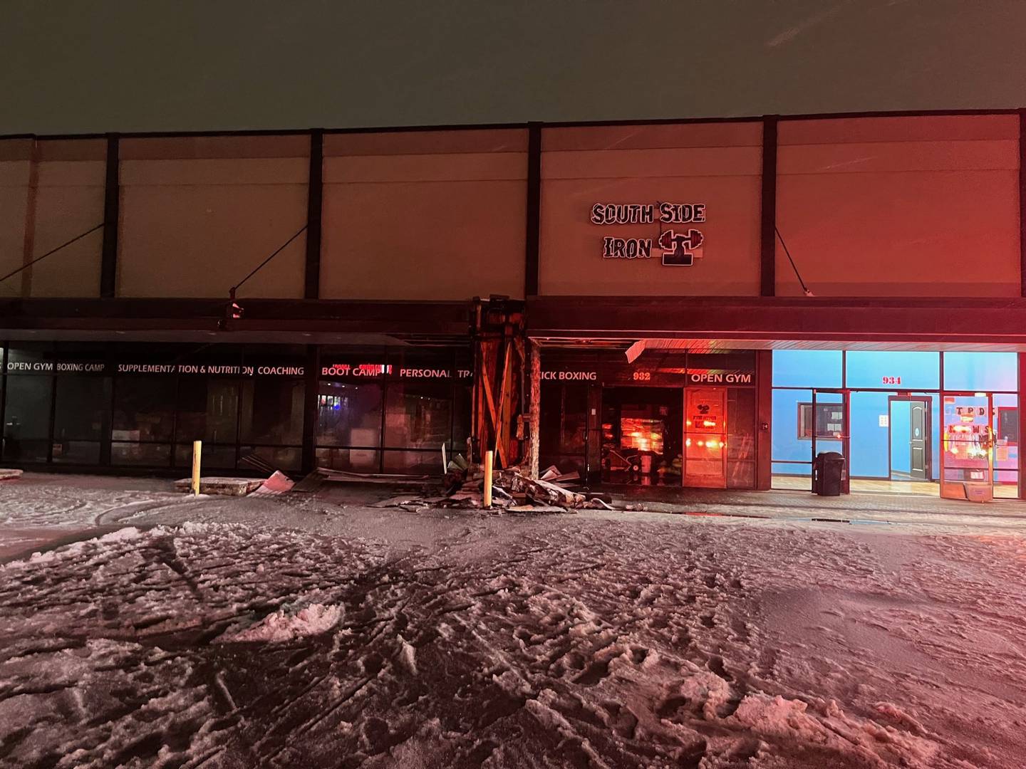 Lockport Fire Investigators is working to determine the cause of a fire on Friday night at a strip mall in the 900 block of East 9th Street in Lockport.