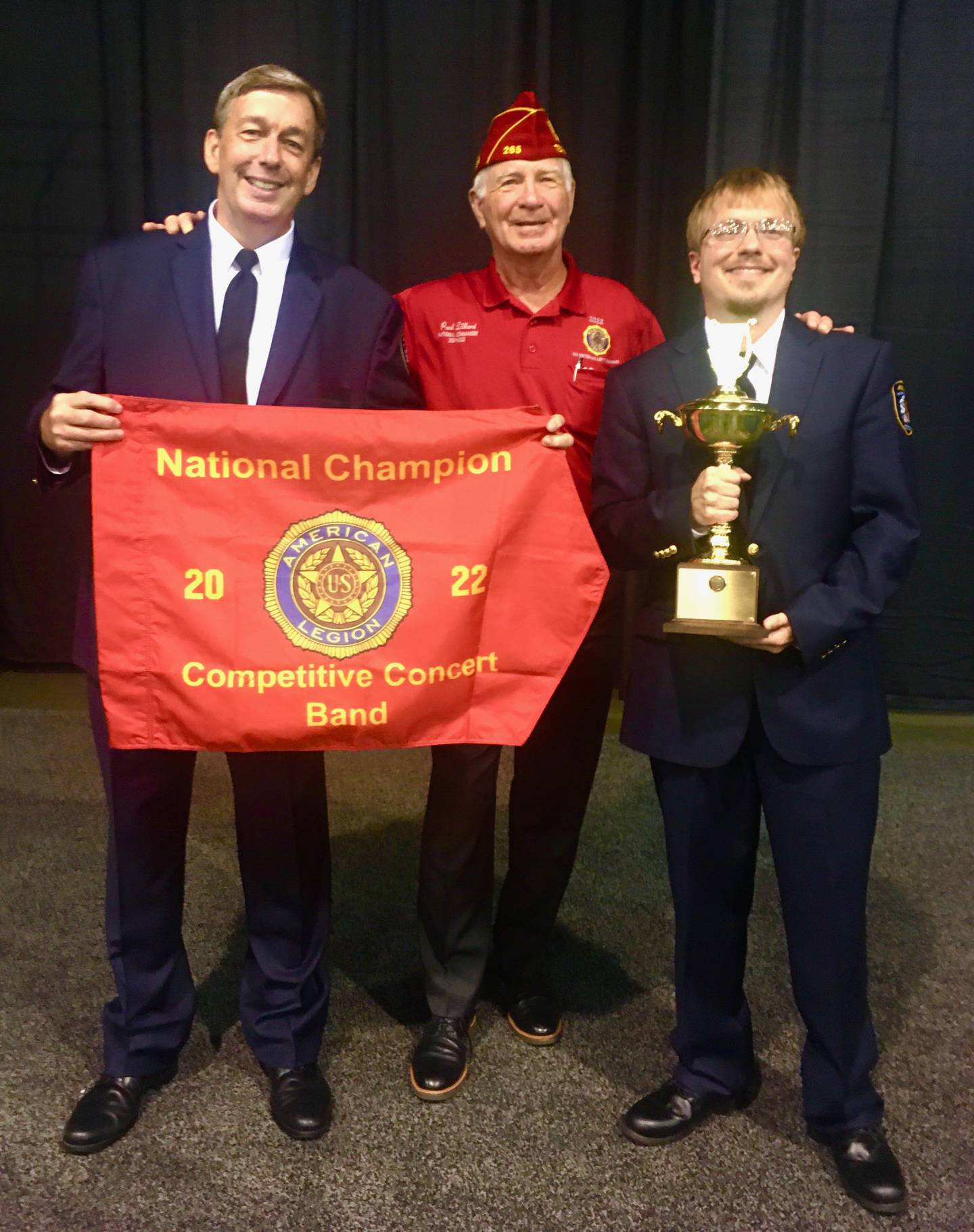 The Joliet American Legion Band again showed its championship on Aug. 28 by winning the American Legion’s 2022 National Concert Band Contest in Wisconsin. Pictured, from left, are the Joliet American Legion Band Director Michael Fiske, the 2021 to 2022 National Commander of The American Legion Paul Dillard, and the 2021 and 2022 Joliet American Legion Band President Matthew R. Witt.