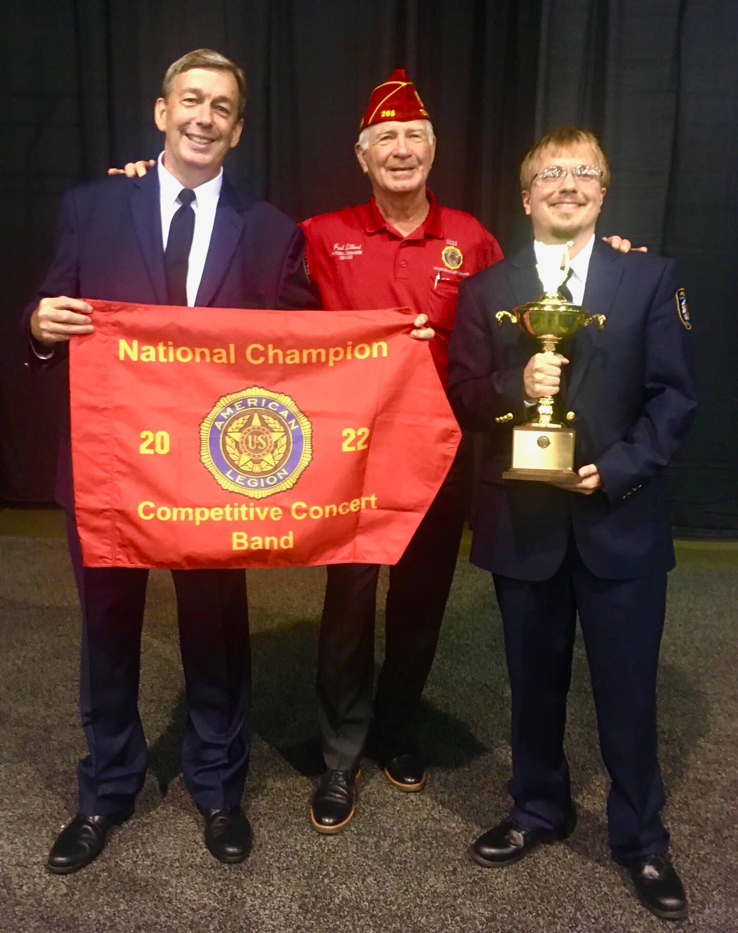 The Joliet American Legion Band again showed its championship on Aug. 28 by winning the American Legion’s 2022 National Concert Band Contest in Wisconsin. Pictured, from left, are the Joliet American Legion Band Director Michael Fiske, the 2021 to 2022 National Commander of The American Legion Paul Dillard, and the 2021 and 2022 Joliet American Legion Band President Matthew R. Witt.