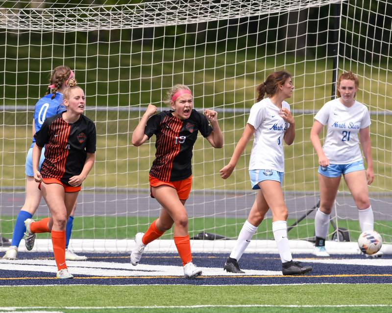 St. Charles East Taum Smith (19) celebrates after scoring a goal in the overtime portion of the sectional title game on Saturday May 27th while taking on St. Charles North held at West Chicago Community High School.