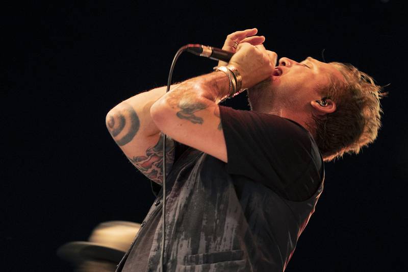 Blind Melon frontman Travis Warren sings Thursday, July 3, 2025, at Dixon’s Petunia Fest. The crowds were deep with current and nostalgic fans enjoying their hard, often psychedelic brand of music.
