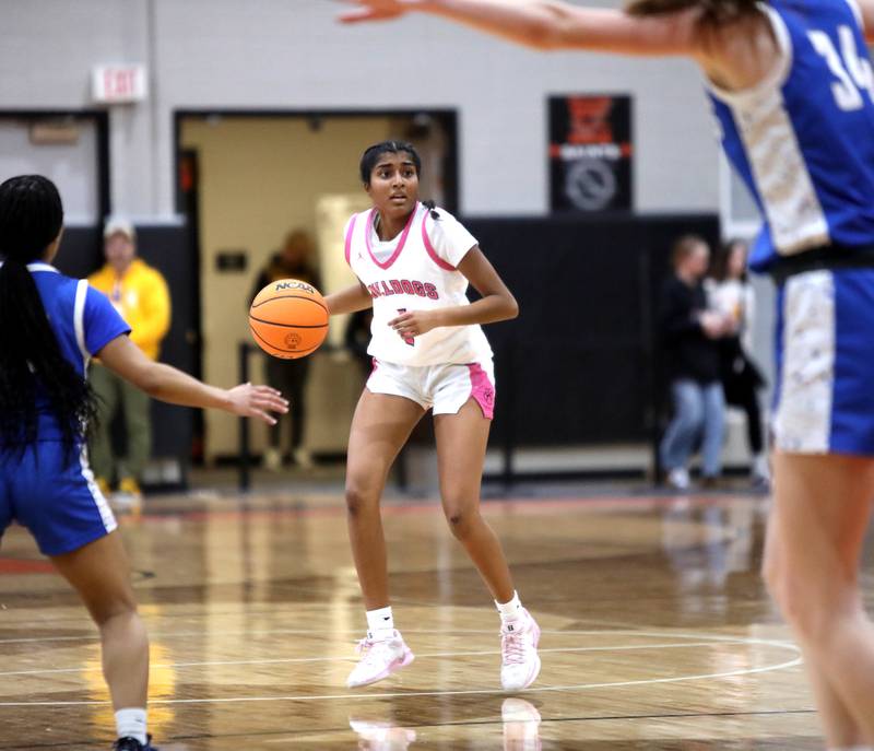 Batavia's Julia Arulandu looks to pass the ball during a Class 4A St. Charles East Sectional semifinal against Wheaton North on Tuesday, Feb. 25, 2025 in St. Charles.