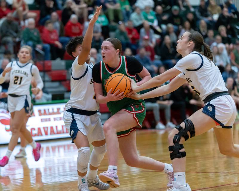 Alexus Hines of LP battles through Sterling defense to grab the layup during the IHSA Class 3A Girls Basketball Regionals in Sellett Gym on February 6, 2026 at LaSalle-Peru High School.