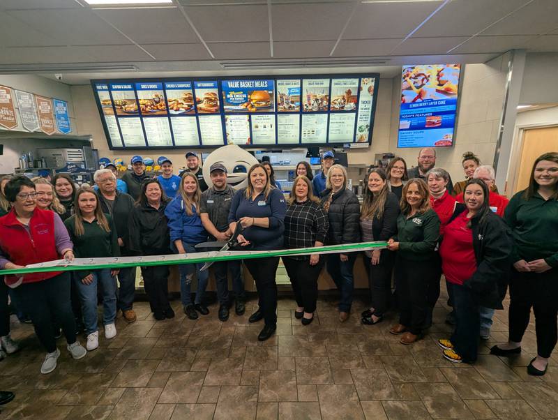 Culver’s of Rock Falls Owner/Operator Ashlee Alber prepares to cut the ribbon Friday at a ceremony celebrating a major remodeling project at the business, 1901 Harley-Davidson Drive, Rock Falls. She is pictured with General Manager John Kelly,business managers and staff, Rock Falls Mayor Rod Kleckler, the Rock Falls Chamber Board and Ambassadors and members of the Sauk Valley Area Chamber of Commerce. The restaurant is open from 10 a.m. to 10 p.m. Monday-Sunday.