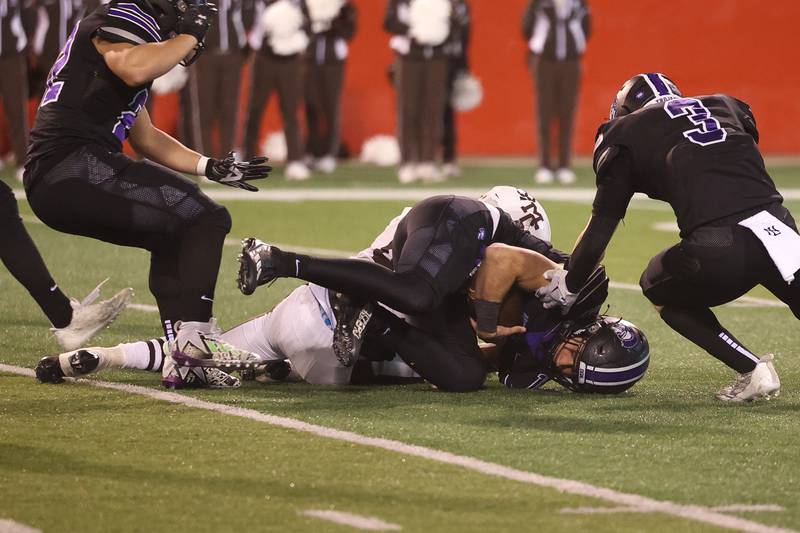 Downers Grove North’s Weston Waughop recovers the botched punt by Mt. Carmel in the Class 7A championship on Saturday, Nov. 25, 2023 at Hancock Stadium in Normal.