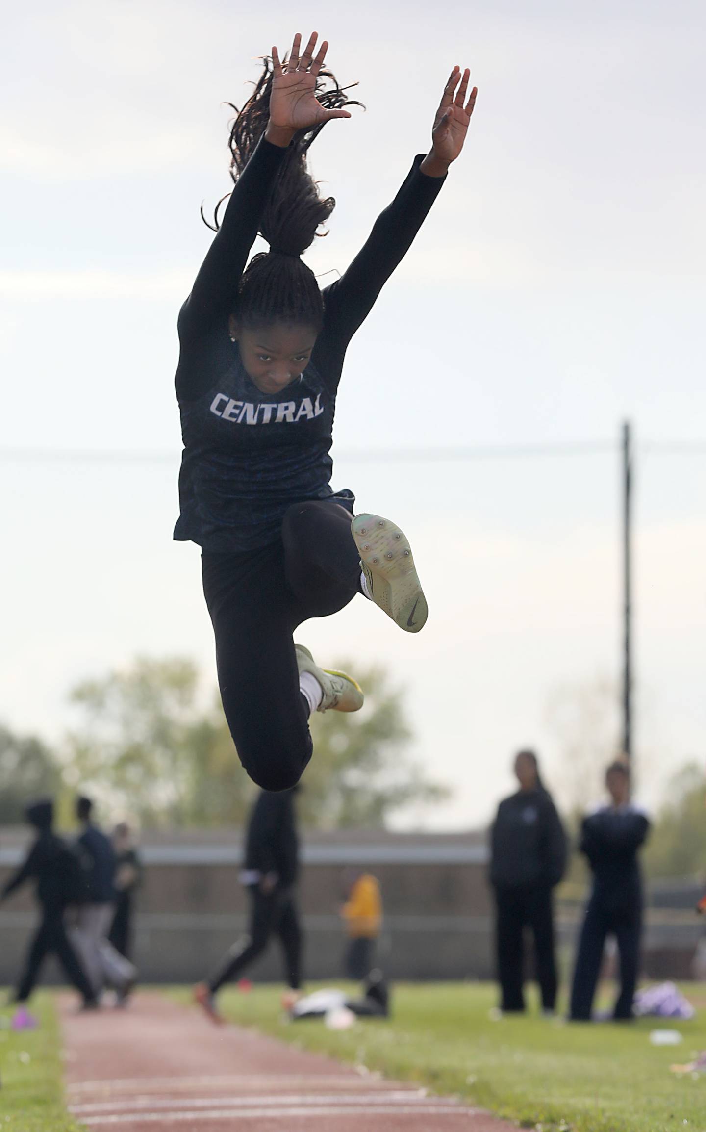 Burlington Central's LaRaiya Cunningham-Duncan competes in the triple jump on Thursday, May 7, 2026, during the Fox Valley Conference Girls Track and Field Meet at Huntley High School.