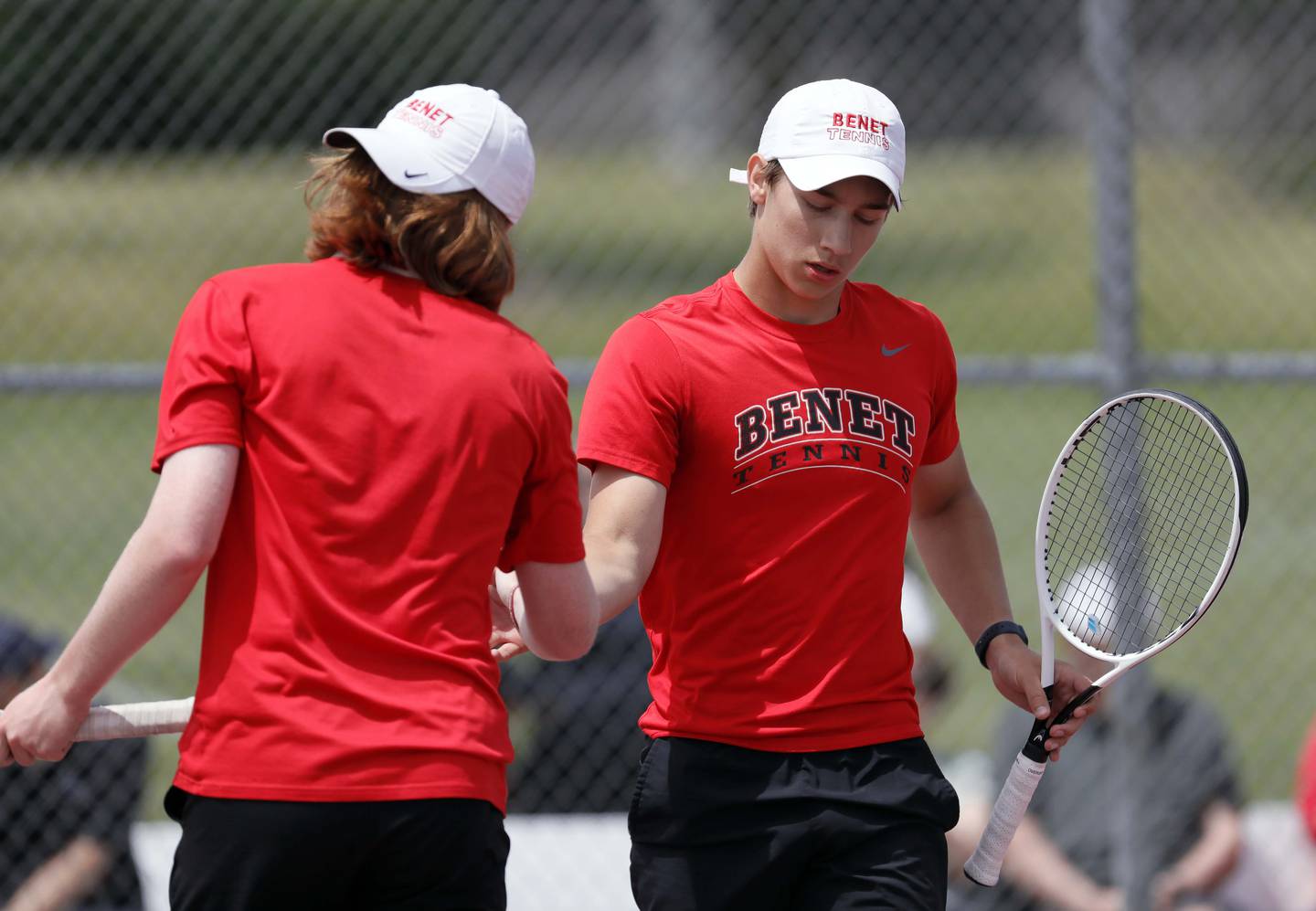 Benet's Zach Bobofchak, right, and Hugh Davis react after losing a point against Chicago Latin in the 1A doubles Championship game during the IHSA State Tennis Finals Saturday May 27, 2023 in Palatine.