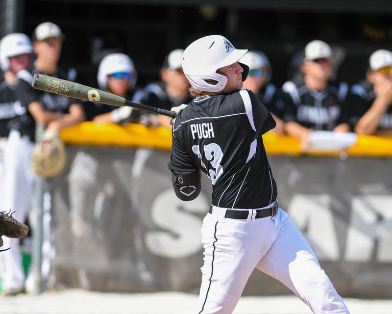 Kaneland Cole Pugh (13) watches as the ball he hit went over the fence for a home run while taking on Dixon High School during a sectional play off game on Wednesday June 1st in Sycamore.