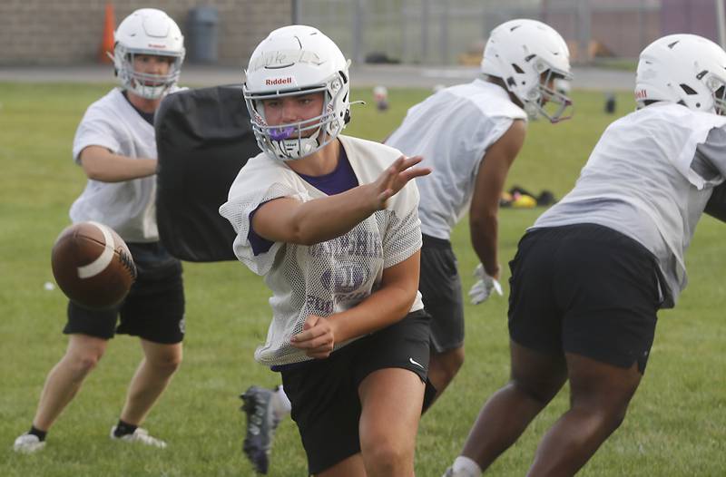 Hampshire’s Luke Lacke pitches the ball during the first day of football practice Monday, August 7, 2023, at Hampshire High School.