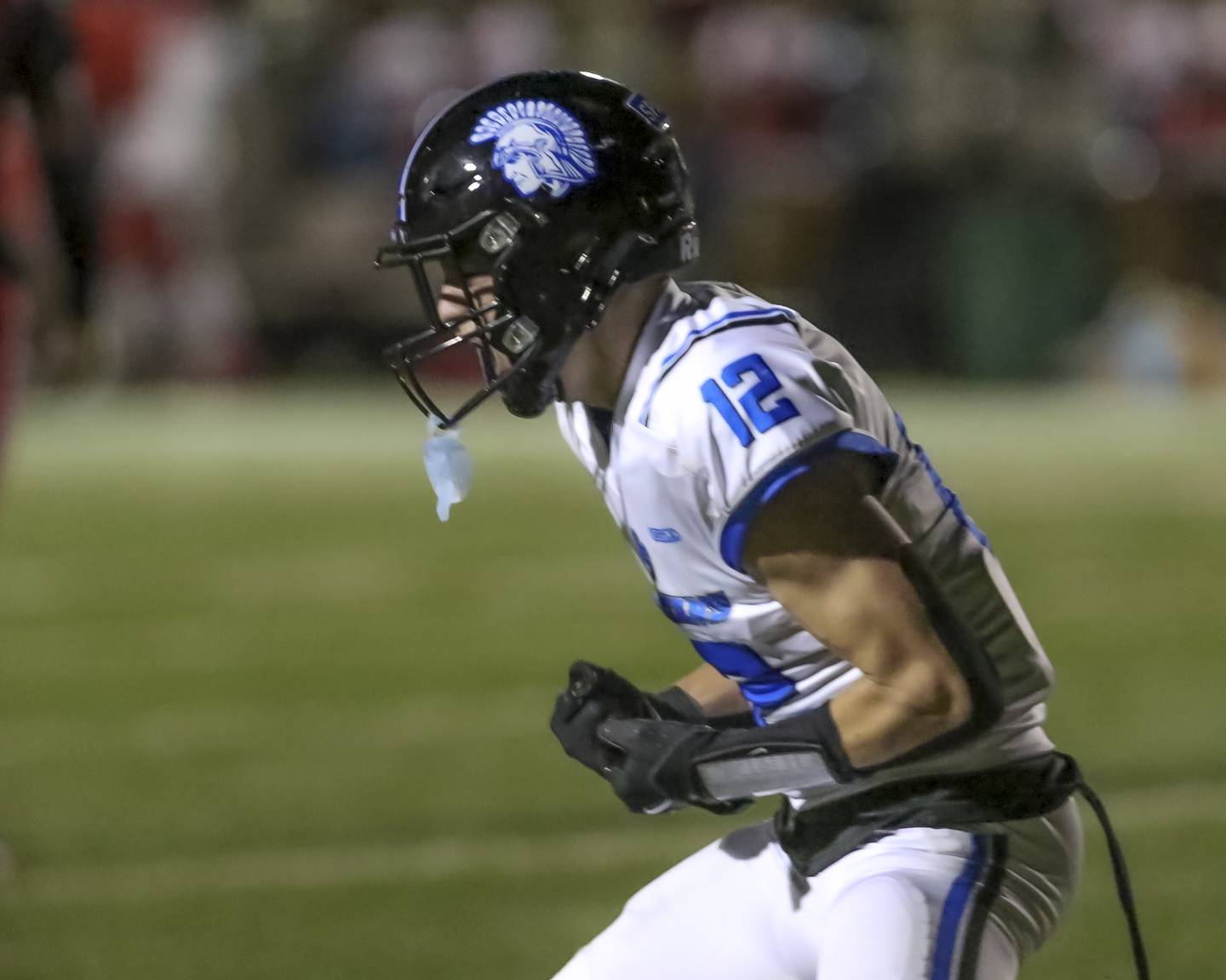 St. Francis's Dario Milivojevic (12) celebrates a touchdown during football game between St. Francis at Kenwood Academy on Thursday, Aug 28, 2025  in Chicago.