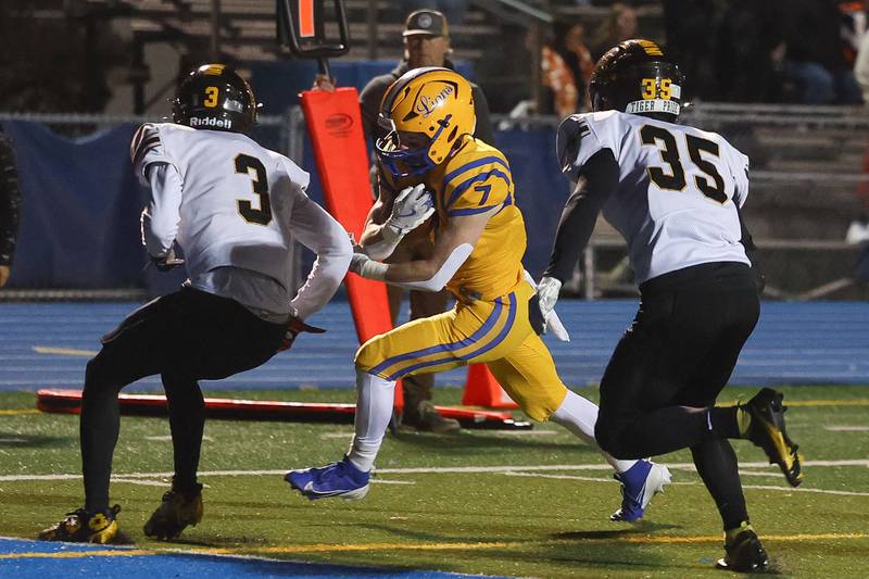 Lyons Township’s Danny Carroll runs in for a touchdown against Joliet West in the first round of the playoffs on Friday, Nov. 1, 2024 in La Grange.