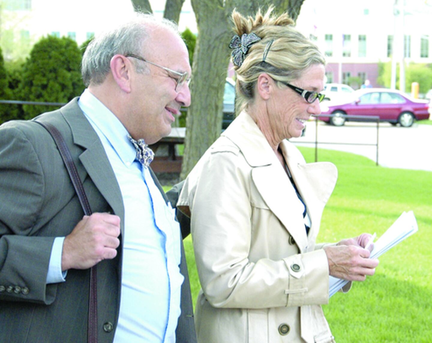 U.S. Public Defender Paul Gaziano and Dixon Comptroller Rita Crundwell leave the Federal Courthouse in Rockford Wednesday afternoon. Prosecutors say Crundwell, 59, took more than $30 million in taxpayer money.