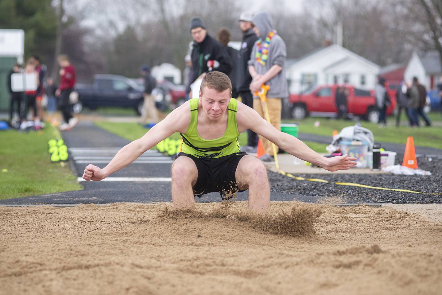 Rock Falls' Kyle Young lands his triple jump Friday, April 22, 2022 at the Rock Falls track invitational.