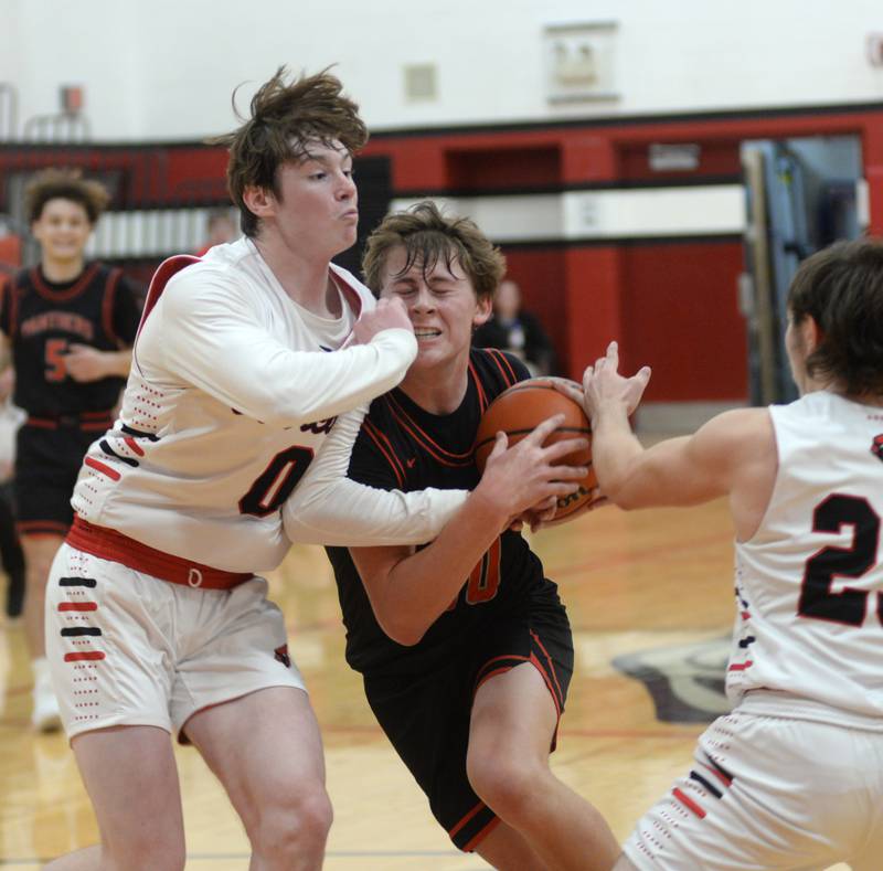 Erie-Prophetstown's Evan Steimle collides with Forreston's Brendan Greenfield during.a Saturday, Dec. 30, 2023 game at the Warkins Memorial Tournament at Erie High School.