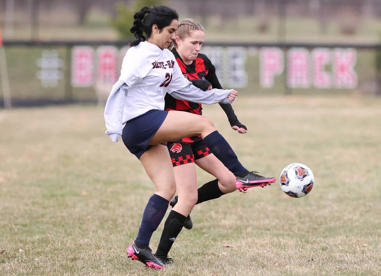 DePue's Lizbeth Paz tries to kick the ball away from Indian Creek's Alexa Anderson during their game Tuesday, April 5, 2022, at