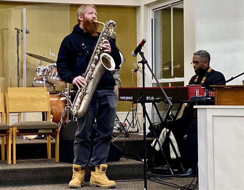 Jacob Slocum performs "Agape" on the saxophone accompanied by Vincent Bland (right) on keyboard during the annual Martin Luther King, Jr. Celebration event held Monday, Jan. 20, 2025, at New Hope Missionary Baptist Church, 1201 Twombly Road, DeKalb.