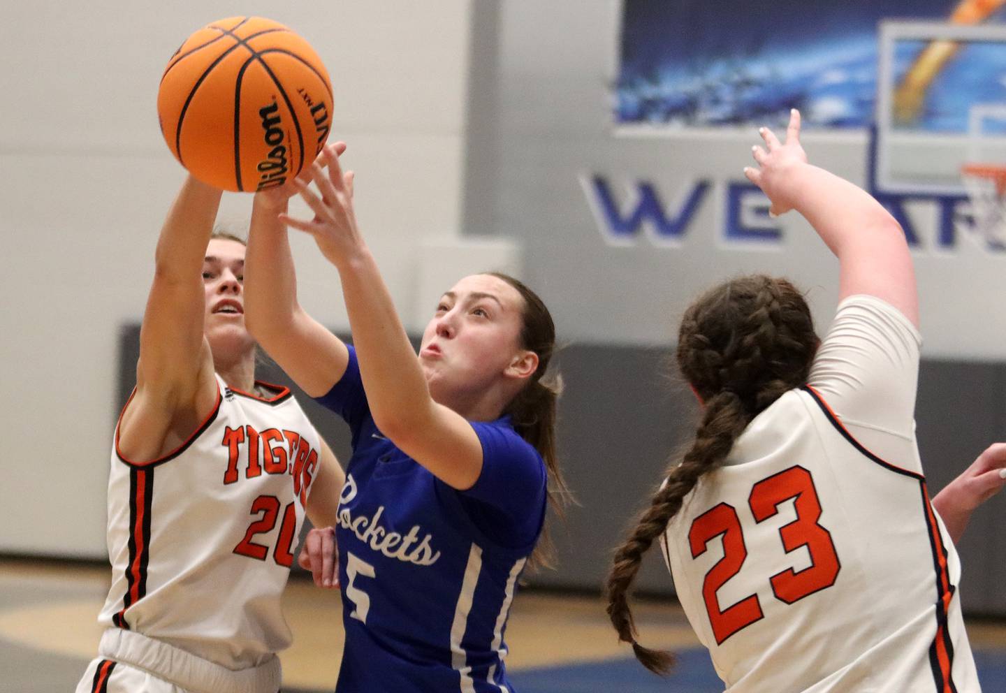 Burlington Central’s Audrey LaFleur, right, battles Crystal Lake Central’s Hadley Ferrero, left, in IHSA Class 3A Regional Title Game girls basketball action on Thursday, Feb. 20, 2025, at  Central High School in Burlington.