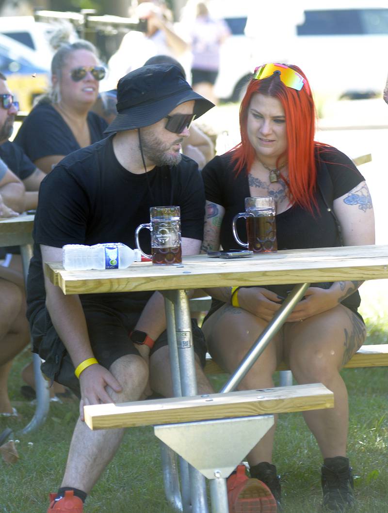 With warm temperatures in place, a spot in the shade was essential to enjoy one of the many beers available Saturday during Ottawa’s Oktoberfest on the Jordan Block.