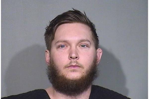 Marengo man accused of restraining woman by screwing apartment door shut