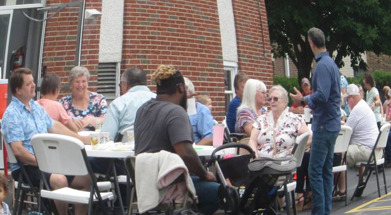 Pictured are several church family members enjoying the picnic and fellowship at the United Methodist Church of Plano picnic.