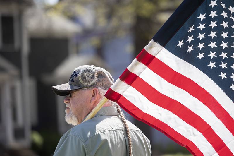 Navy veteran Joe Willwerth of Dixon shows his appreciation for other veterans Saturday, April, 26, 2025, during a parade in Dixon. Dixon VFW Post 540 held a Vietnam veteran parade down Galena Avenue to recognize those veterans who didn’t receive the thank you they deserved.