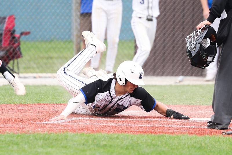 Lincoln-Way East’s Gavin LaDere scores the game winning run in the bottom of the 7th against Libertyville on Saturday, May 13, 2023 in Frankfort.