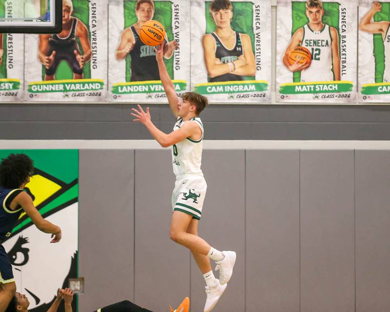 Bishop Mcnamara's Coen Demack (10) puts up a shot during their Class 2A Seneca Sectional final basketball game between Bishop McNamara at Yorkville Christian, March 6, 2026 in Senaca.