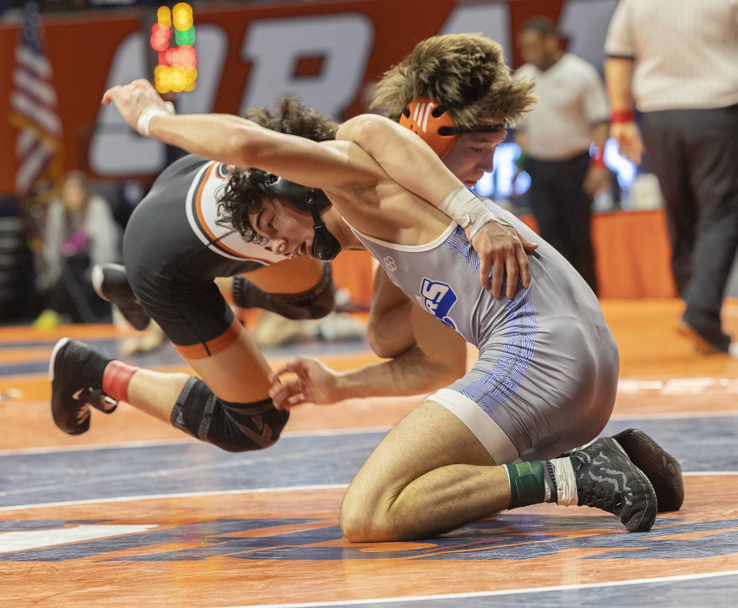 Princeton’s Ace Christiansen (right) and Sandwich’s Cooper Corder face off in the 138 pound 1A third place match Saturday, Feb. 17, 2024 at the IHSA state wrestling finals at the State Farm Center in Champaign.