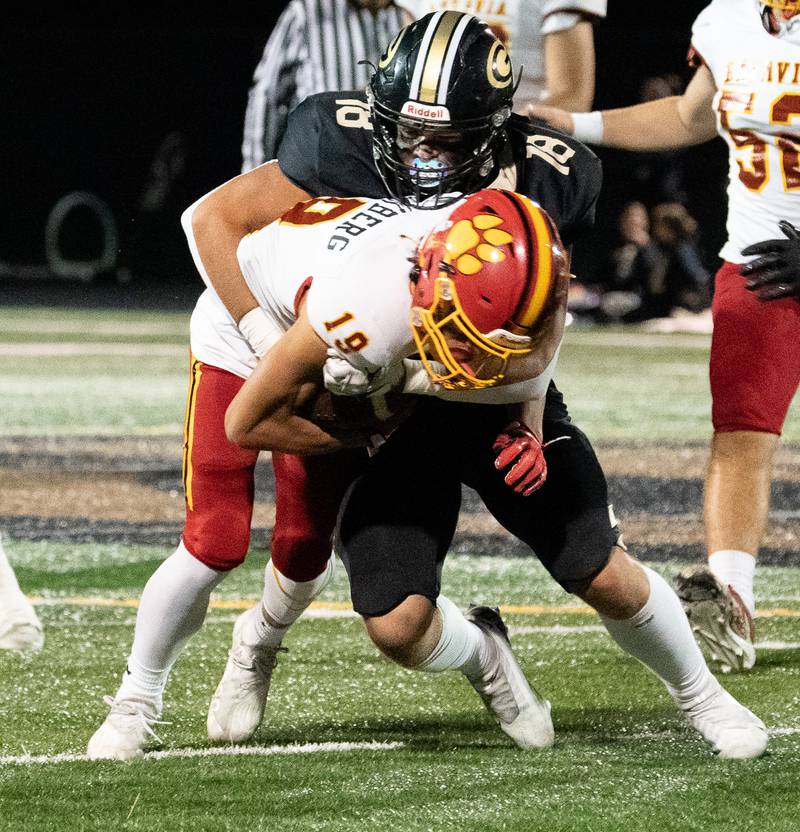 Glenbard North's Hendee Dylan (18) tackles Batavia’s Zach Granberg (19) during a football game at Glenbard North High School in Carol Stream on Friday, Sep 23, 2022.
