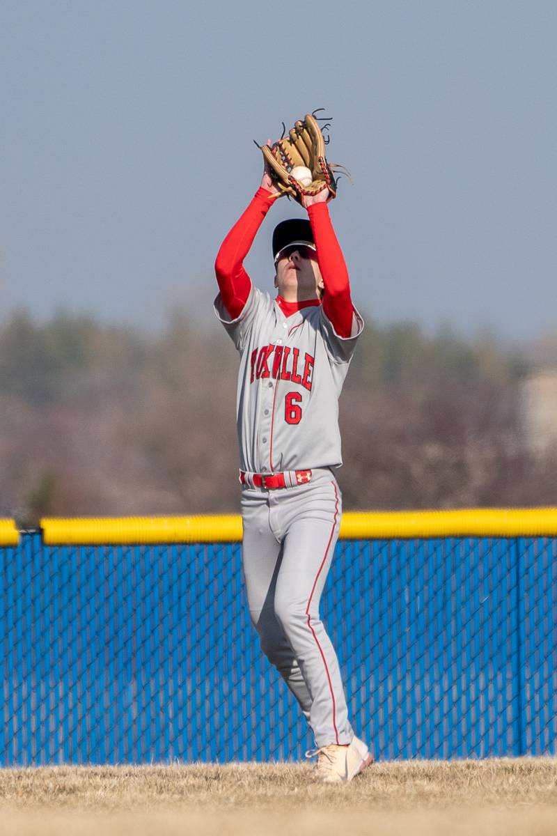 Yorkville's Kyle Munch (6) catches a fly-ball for an out against Marmion during a baseball game at Marmion High School in Aurora on Tuesday, Mar 28, 2023.