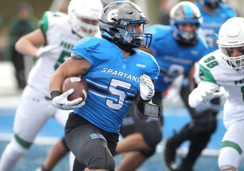 St. Francis’ Dom Beres runs the ball during their Class 4A semifinal game against Providence in Wheaton on Friday, Nov. 19. 2022.