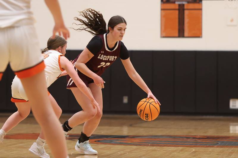 Lockport’s Goda Arstikaitis works the ball at the top of the key against Lincoln-Way West on Tuesday, Feb. 3, 2026 in New Lenox.
