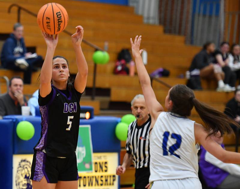 Downers Grove North’s Campbell Thulin (5) shoots from three point range during a game on January 10, 2026 at Lyons Township High School in LaGrange.
