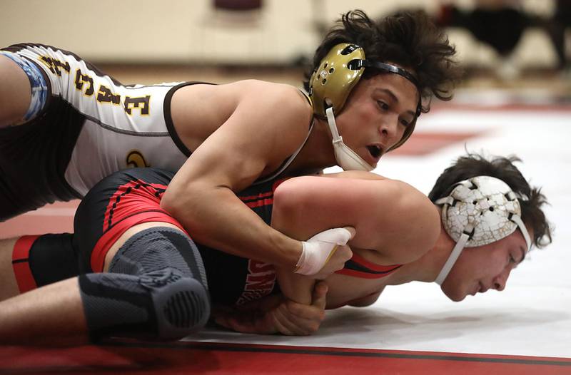 Jacobs’ Ben Arbotante controls Huntley’s Colin Abordo during the 126—pound match of a Fox Valley Conference wrestling meet on Thursday, Dec. 11, 2025, at Huntley High School.