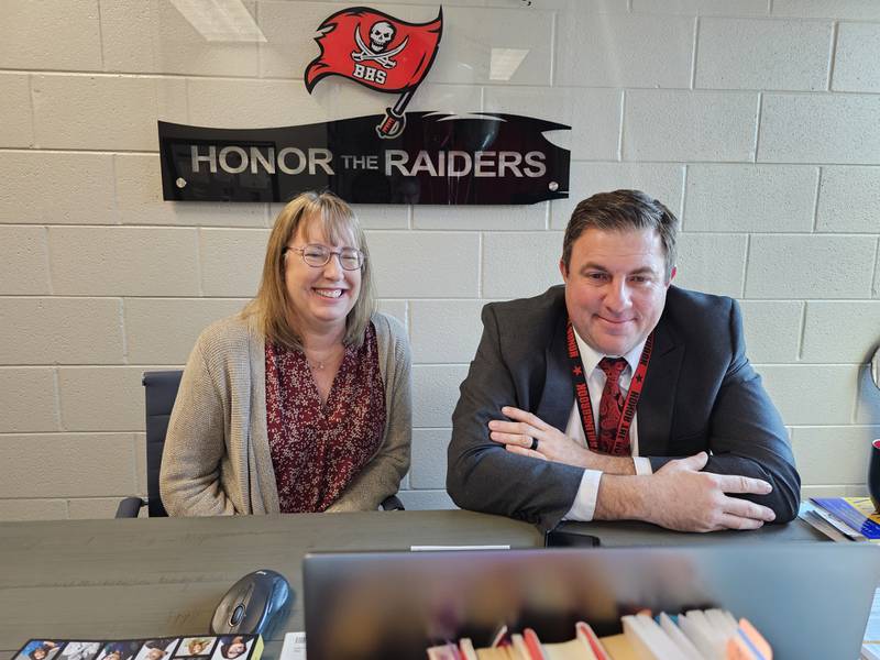 Bolingbrook High School Social Studies Teacher Colleen Guccione (left) and Principal Dr. Jason Pascavage (right) received the news that Guccione has been named as a finalist for Illinois Teacher of the Year via Zoom.