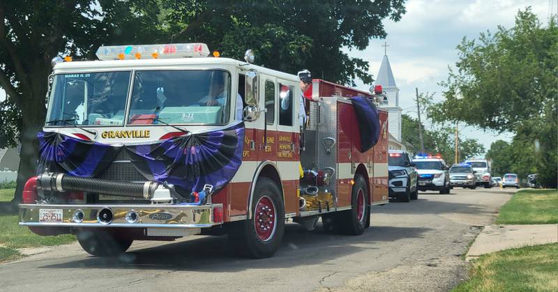 A Granville Fire Department fire truck leads the way in a funeral procession honoring Arthur Ramey, who for 36 years was a volunteer with that department before his unexpected passing on June 9. Representatives of dozens of police and fire departments from all over northern Illinois paid tribute to the late resident of Mark.