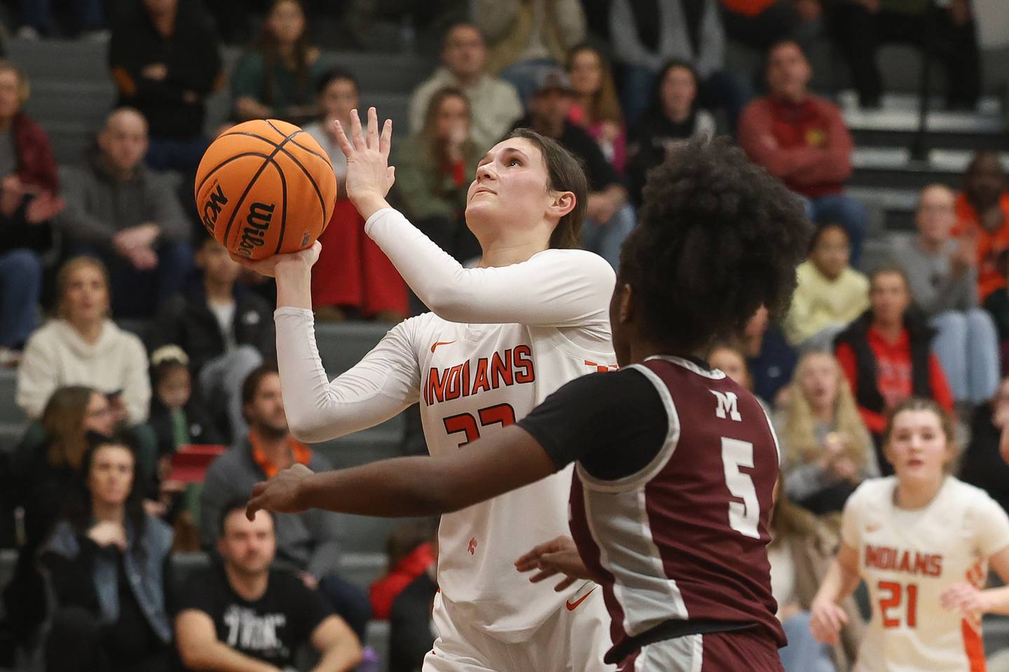 Minooka’s Clare O’Brien takes a shot under the basket against Moline in the Class 4A Minooka Regional championship game on Thursday, Feb. 19, 2026 in Minooka.
