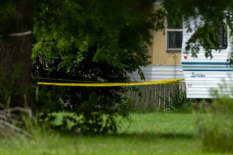 Caution tape is placed at crime scene of double homicide on Thursday, July 17, 2025 on 42nd Road in Sheridan.